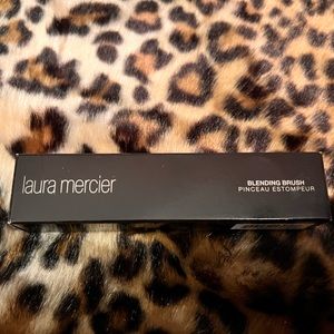Four Laura Mercier Makeup Brushes .